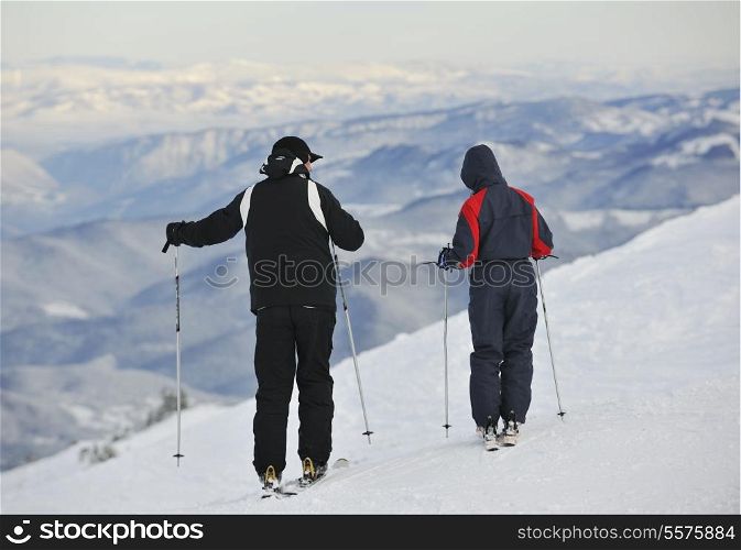 skiers group of+have fun and relaxation on winter mountain
