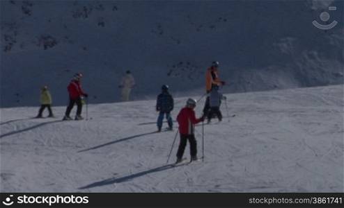 Skiers in Alps ski resort