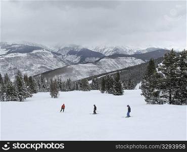 Skiers on a ski slope in Vail, Colorado