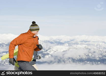 Skiers running