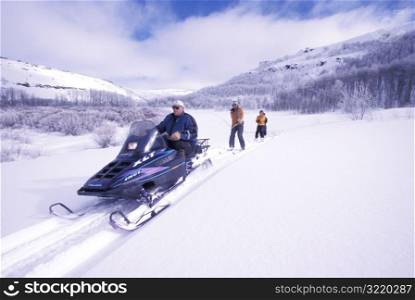Skiing Behind a Snowmobile
