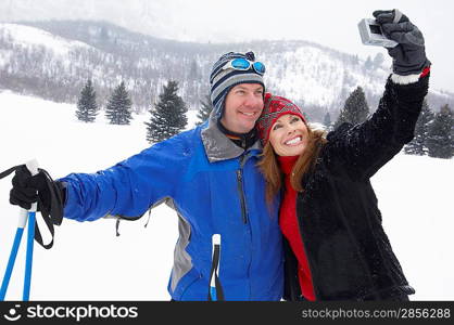 Skiing Couple Posing for Photo