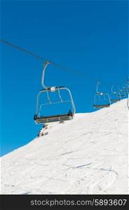 Skilift on ski resort during winter on bright day