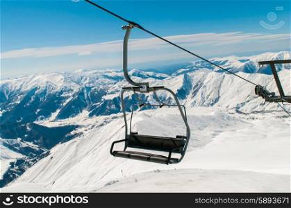 Skilift on ski resort during winter on bright day