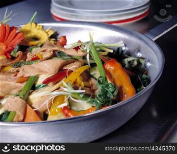 Skillet with Vegetables and Gerber Daisies