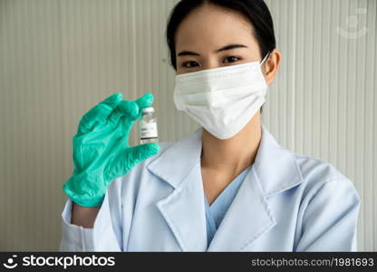 Skillful doctor prepare vaccine proficiently before injection . Covid 19 and coronavirus vaccination center service concept .. Skillful doctor prepare vaccine proficiently before injection