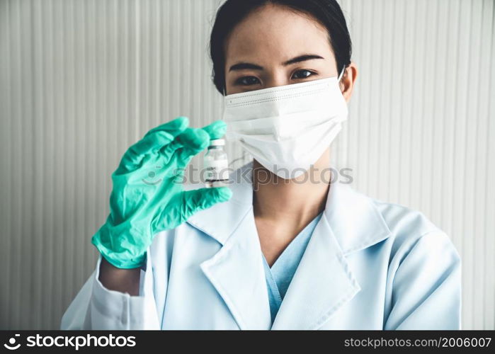 Skillful doctor prepare vaccine proficiently before injection . Covid 19 and coronavirus vaccination center service concept .. Skillful doctor prepare vaccine proficiently before injection