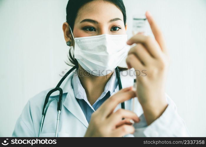 Skillful doctor prepare vaccine proficiently before injection . Covid 19 and coronavirus vaccination center service concept .. Skillful doctor prepare vaccine proficiently before injection