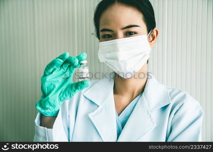 Skillful doctor prepare vaccine proficiently before injection . Covid 19 and coronavirus vaccination center service concept .. Skillful doctor prepare vaccine proficiently before injection