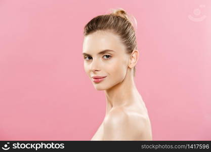 Skin Care Concept - Charming young caucasian woman with perfect makeup photo composition of brunette girl. Isolated on pink background with Copy Space. Skin Care Concept - Charming young caucasian woman with perfect makeup photo composition of brunette girl. Isolated on pink background with Copy Space.