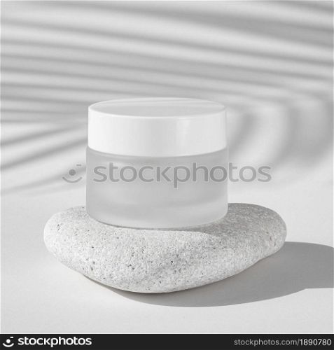 skin care moisture recipient on a white rock . Resolution and high quality beautiful photo. skin care moisture recipient on a white rock . High quality and resolution beautiful photo concept