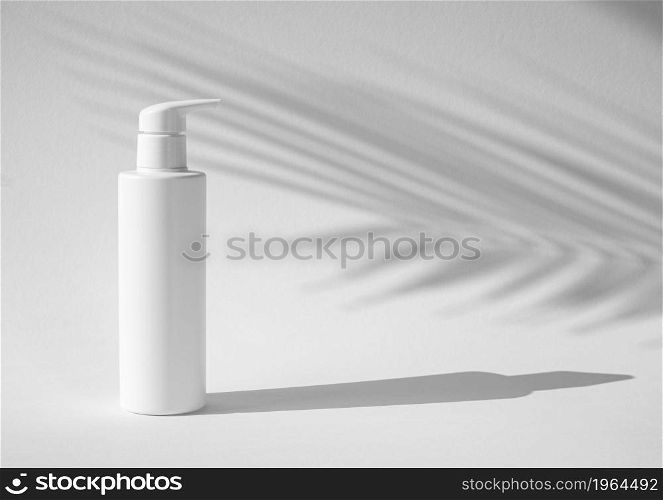 skin care product with tropical leaf shadow. High resolution photo. skin care product with tropical leaf shadow. High quality photo