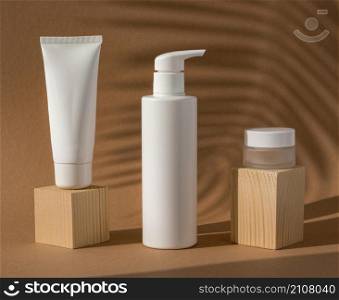 skin products arrangement wooden blocks