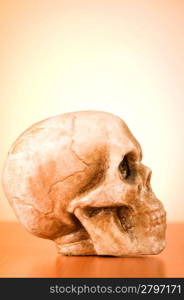 Skull of human against the gradient background