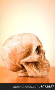 Skull of human against the gradient background