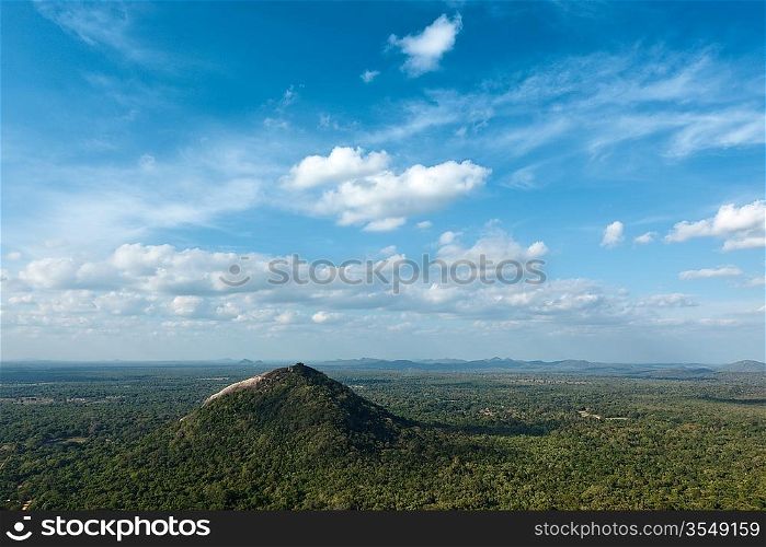 Sky above small mountains, covered with trees. Sri Lanka