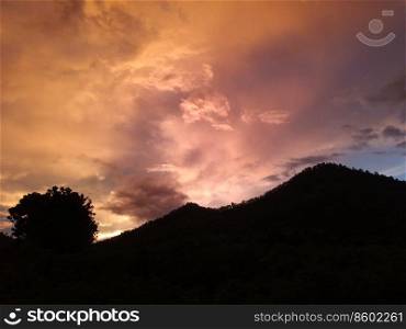 sky and cloud with sunlight over mountain