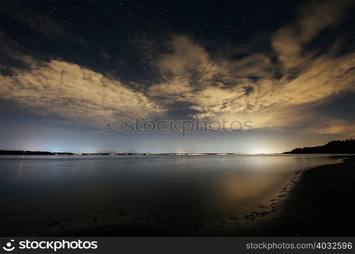 Sky and clouds over Puget Sound at night, Seattle, Washington, USA