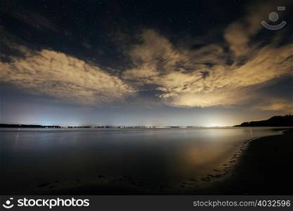 Sky and clouds over Puget Sound at night, Seattle, Washington, USA