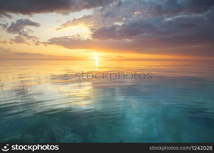 Sky background and water reflection on sunset. Nature composition.