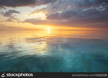 Sky background and water reflection on sunset. Nature composition.