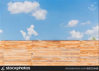 Sky background with wooden planks.