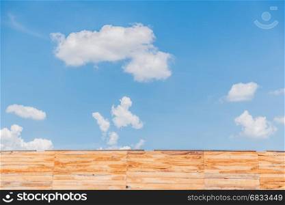 Sky background with wooden planks.