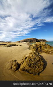 sky cloud beach water coastline and summer in lanzarote spain