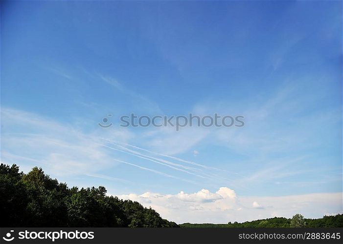 sky , clouds and trees landscape