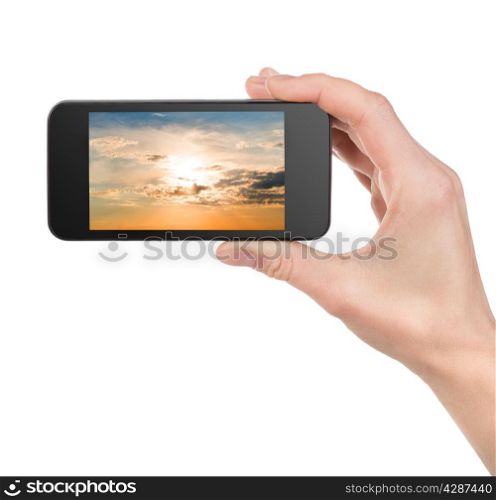 Sky in a phone in hands isolated on white