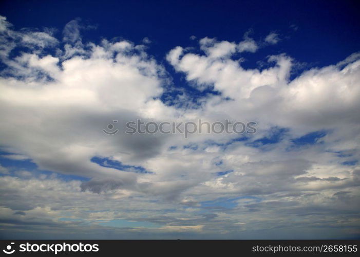 sky in blue simple nature background with white clouds