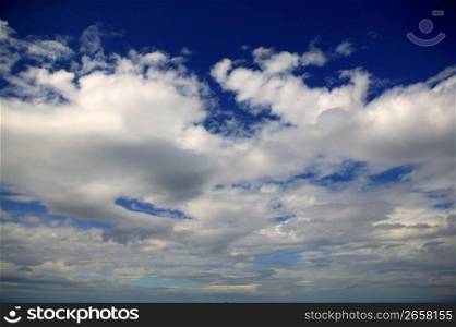 sky in blue simple nature background with white clouds
