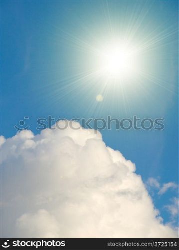 Sky vertical background with heap cloud and shining sun.