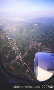 Sky view from airplane. Aerial view from windows. Transportation Concept.