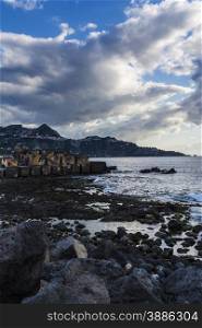 Sky with clouds before a rainstorm over the the sea at Giardini-Naxos, Sicily, Italy