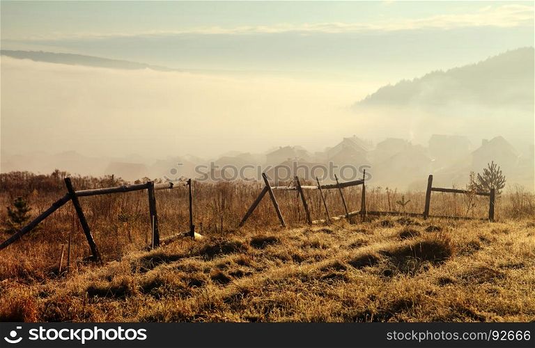 sky with fog over countryside at autumn