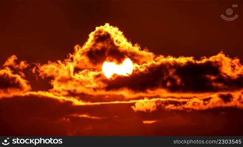 Sky with sun in clouds of altitude. Cloud the evening sky at sunset