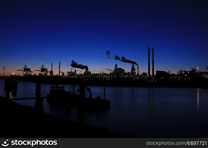 Skyline of an industrial area during sunset