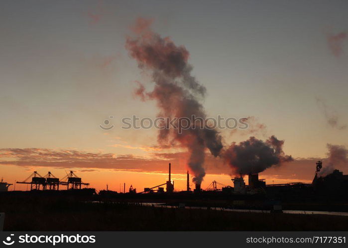 Skyline of an industrial area during sunset