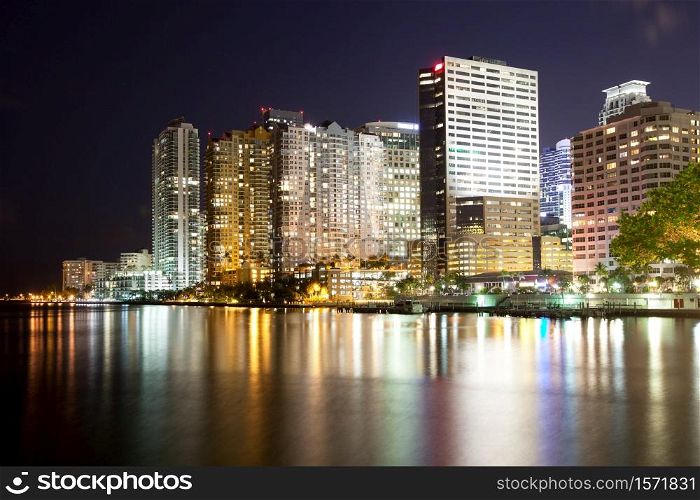 Skyline of apartment buildings at Brickell district in Miami at night, Florida, USA