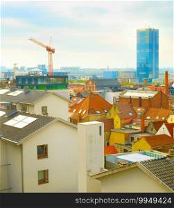 Skyline of Brussels with Old Town and construction site of modern buildings