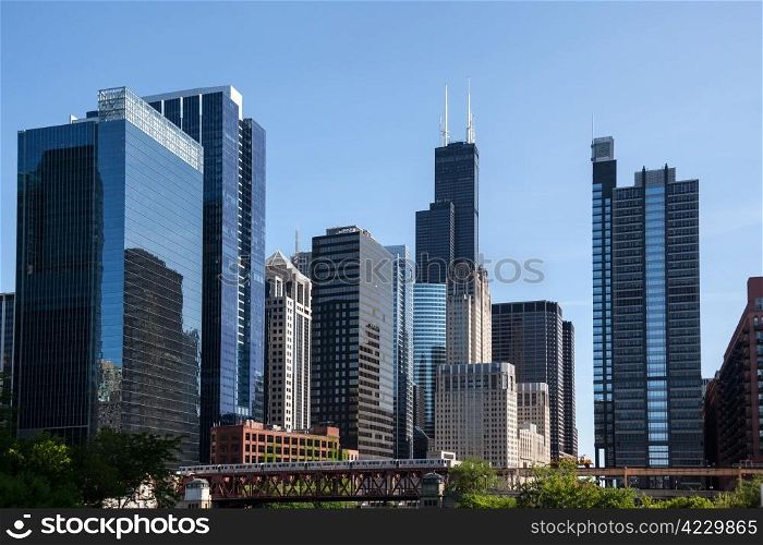 Skyline of Chicago from the river with Willis tower in distance