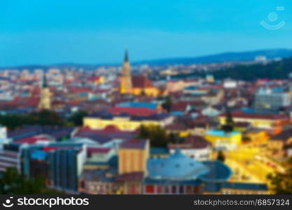 Skyline of Cluj-Napoka - capital of Transylvania. Romania. Lens blur