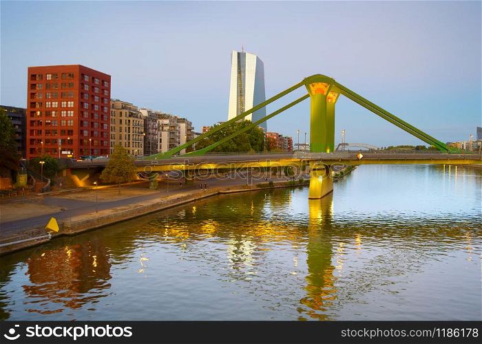 Skyline of Frankfurt with Main river, Green Bridge and European Central Bank in the background. Frankfurt, Germany