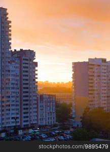 Skyline of Kyiv typical living district in the rain at sunset. Ukraine