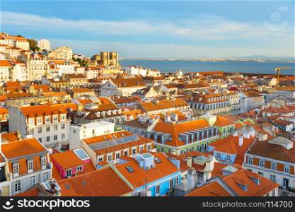 Skyline of Lisbon with famous Lisbon Cathedral at sunset. Portugal