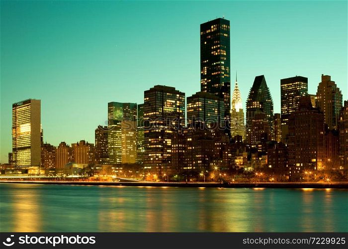 Skyline of midtown Manhattan at night, New York City, USA
