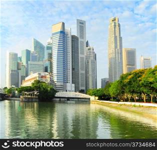 Skyline of Singapore downtown with reflection in the river