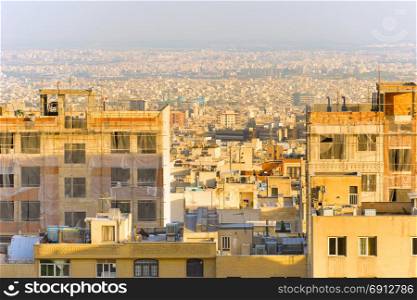 Skyline of Tehran with residential building on foreground. Iran