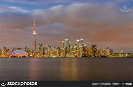 Skyline of Toronto Downtown over Ontario Lake at sunset, Toronto,
